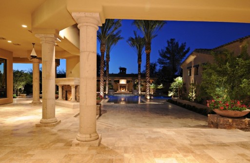 Extensive Cantera columns and travertine patio